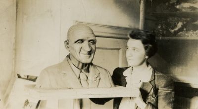 Lucy Cherry Crisp with her bust of George Washington Carver