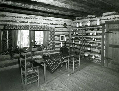 Dining room of the Busbee's home, named Jugtown, 1952. Image from the North Carolina Museum of History.